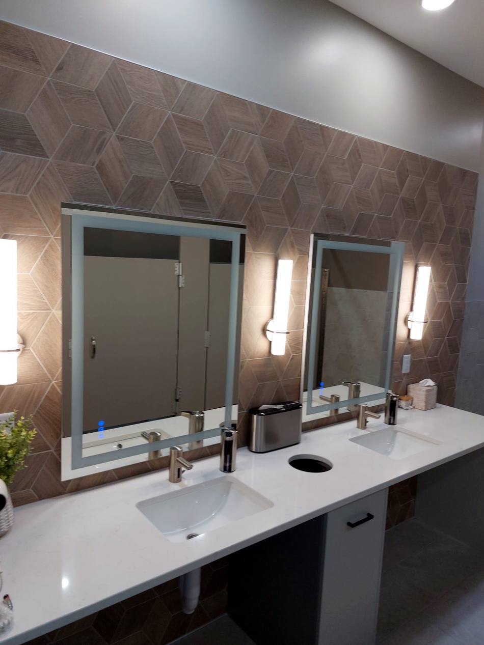Finished commercial restroom with double vanity